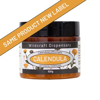 Jar of Calendula botanical compound with Wildcraft Dispensary label on a white background