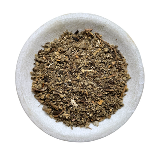 dried mullein in a small white bowl on a white background