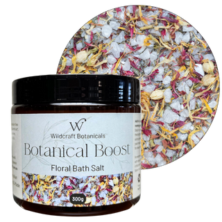 Jar of Wildcraft Botanicals Botanical Boost Floral Bath Salt with a close-up of bath salt mix.