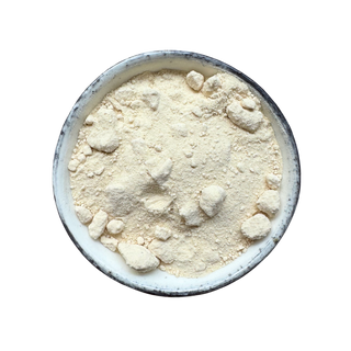 Powdered frankincense in a bowl on a white background
