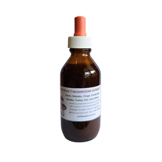 Brown bottle of 7 mushroom extract  with a white label on a white background