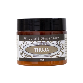 Jar of Thuja botanical compound from Wildcraft Dispensary on a white background