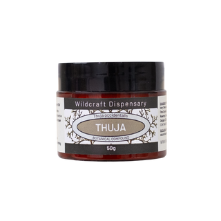 Jar of Thuja botanical compound from Wildcraft Dispensary on a white background