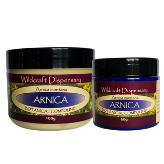 Two jars of Arnica Botanical Compound from Wildcraft Dispensary for bruising swelling and muscle recovery on a white background