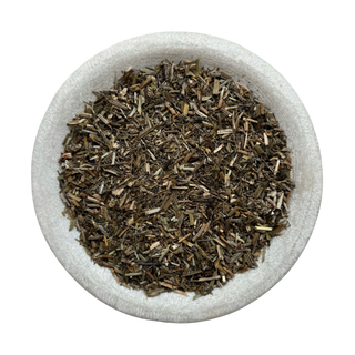 Cleavers in a stone bowl on a white background